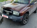 2000 Chevrolet Tracker II, коричневый, 470000 рублей - вид 1