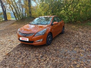 2014 Hyundai Solaris I Рестайлинг, оранжевый, 999000 рублей, вид 3
