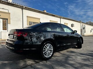 2016 Volkswagen Jetta VI Рестайлинг, чёрный, 1400000 рублей, вид 4