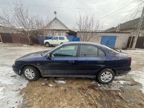 1995 Mitsubishi Carisma I, синий, 110000 рублей - вид 9