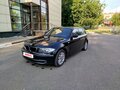 2010 BMW 1 серии 116i I (E81/E82/E87/E88) Рестайлинг, чёрный, 1050000 рублей - вид 1