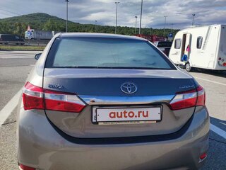 2014 Toyota Corolla XI (E160, E170, E180), коричневый, 1305000 рублей, вид 4