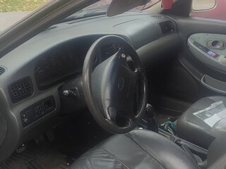 1998 Kia Clarus II, бежевый, 58000 рублей, вид 4