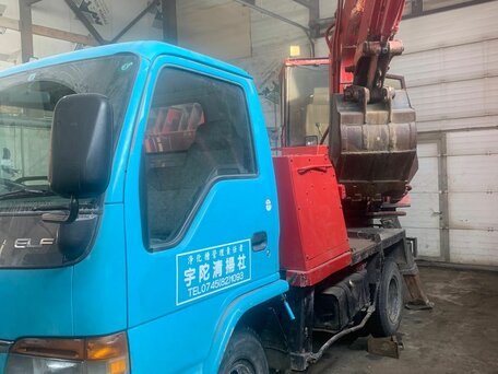 1994 Isuzu Elf (N-series), красный, 1800000 рублей, вид 2