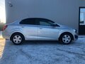 2015 Chevrolet Aveo II, серебристый - вид 3