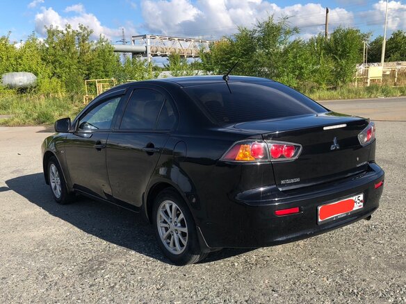2014 Mitsubishi Lancer X Рестайлинг, чёрный, 980000 рублей - вид 13