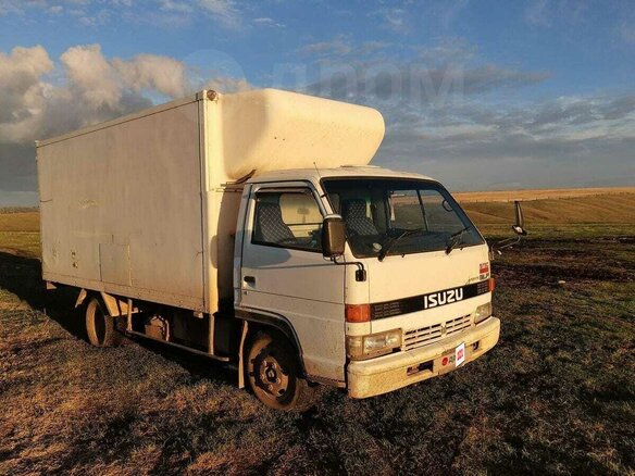 1993 Isuzu Elf (N-series), белый, 600000 рублей - вид 1