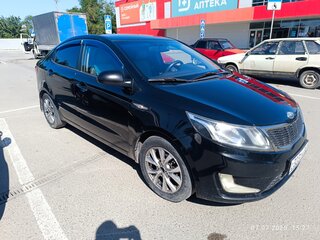 2011 Kia Rio III, чёрный, 575000 рублей, вид 2