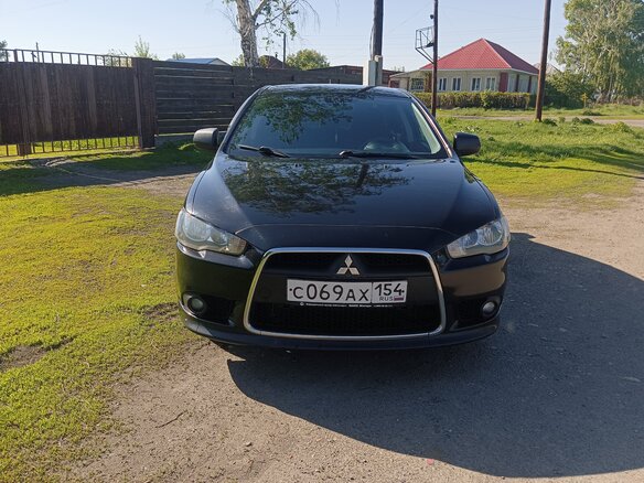 2012 Mitsubishi Lancer X Рестайлинг, чёрный, 1000000 рублей