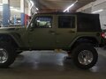 2012 Jeep Wrangler III (JK), зелёный, 11000000 рублей - вид 4