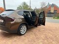 2011 BMW X1 18i I (E84), коричневый, 1450000 рублей - вид 3