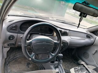 1997 Ford Escort (North America) III, серебристый, 150000 рублей, вид 3