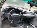 1997 Ford Escort (North America) III, серебристый, 150000 рублей - вид 2