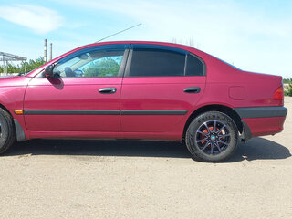 1999 Toyota Avensis I, пурпурный, 550000 рублей, вид 2