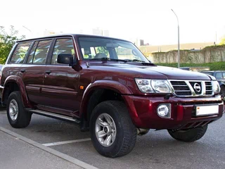 2003 Nissan Patrol V (Y61), пурпурный, 1650000 рублей, вид 1
