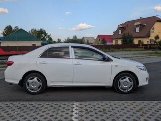 2009 Toyota Corolla X (E140, E150), белый, 730000 рублей, вид 3