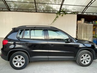 2012 Volkswagen Tiguan I Рестайлинг, чёрный, 1100000 рублей, вид 2