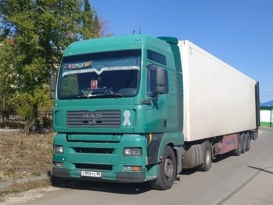2004 MAN TGA, зелёный, 3100000 рублей - вид 1