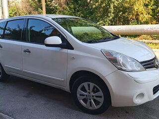 2011 Nissan Note I Рестайлинг, белый, 700000 рублей, вид 2