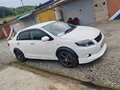 2007 Toyota Corolla Axio X (E140, E150), белый, 570000 рублей - вид 4