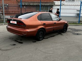 1993 Toyota Corolla VII (E100), коричневый, 180000 рублей, вид 2