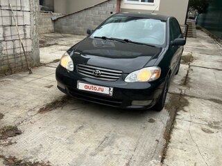 2002 Toyota Corolla IX (E120, E130), чёрный, 700000 рублей, вид 1