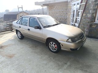 2013 Daewoo Nexia I Рестайлинг, бежевый, 600000 рублей, вид 5