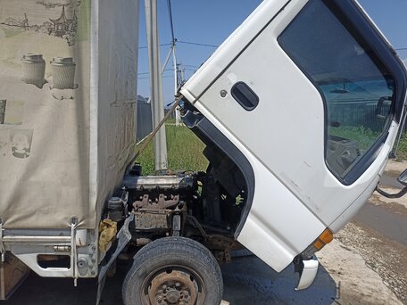 1996 Isuzu Elf (N-series), белый, 950000 рублей, вид 4