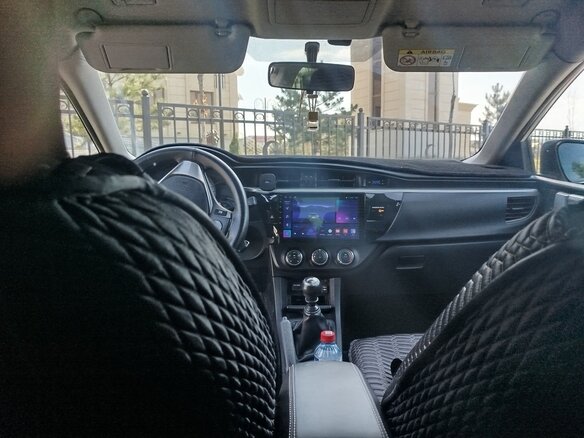 2014 Toyota Corolla XI (E160, E170, E180), белый, 950000 рублей - вид 6