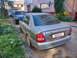 2002 Mazda Familia VIII (BJ), серебристый, 135000 рублей, вид 5
