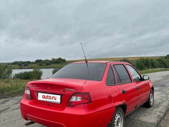 2011 Daewoo Nexia I Рестайлинг, красный, 140000 рублей - вид 3