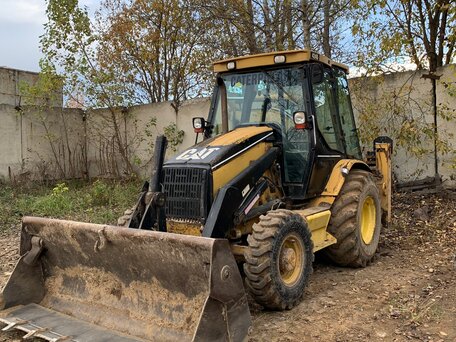 2002 Caterpillar 428, 2800000 рублей, вид 2