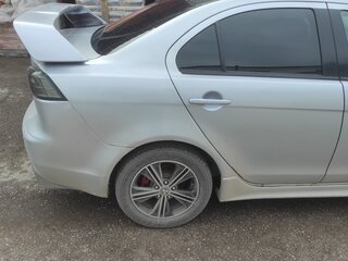 2010 Mitsubishi Lancer X, серебристый, 900000 рублей, вид 3