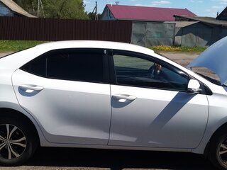 2014 Toyota Corolla XI (E160, E170, E180), белый, 1150000 рублей, вид 2