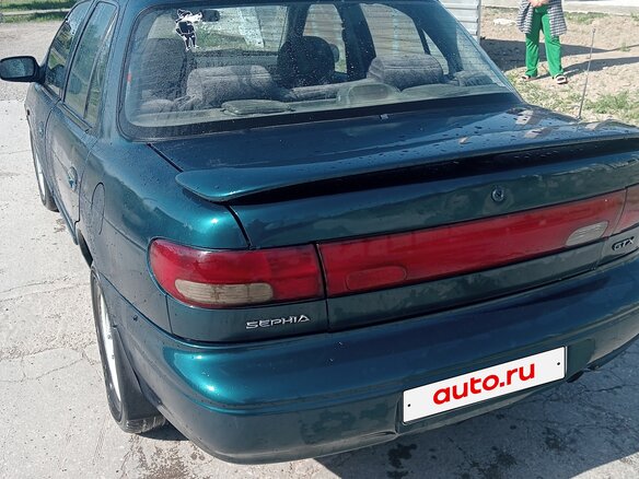 1997 Kia Sephia I Рестайлинг, зелёный, 265000 рублей - вид 16