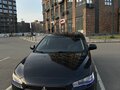 2010 Mitsubishi Lancer X, чёрный, 720000 рублей - вид 2