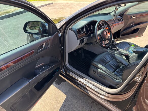 2014 Skoda Superb II Рестайлинг, коричневый, 1000000 рублей - вид 9