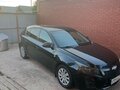 2012 Chevrolet Cruze I, серебристый, 680000 рублей - вид 1