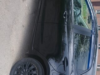 2012 Mazda 2 II Рестайлинг (DE2), чёрный, 820000 рублей, вид 4
