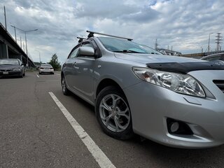 2010 Toyota Corolla X (E140, E150) Рестайлинг, серебристый, 888000 рублей, вид 2