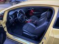 2013 Opel Astra GTC J Рестайлинг, жёлтый, 990000 рублей - вид 6