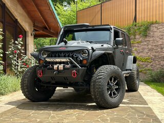 2011 Jeep Wrangler III (JK), чёрный, 4999999 рублей, вид 3