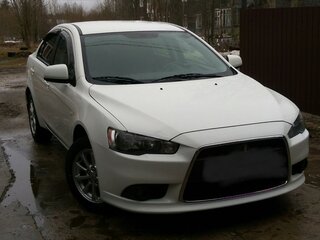 2011 Mitsubishi Lancer X Рестайлинг, белый, 1515000 рублей, вид 1
