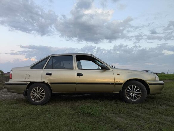 2005 Daewoo Nexia I, золотистый, 110000 рублей - вид 5