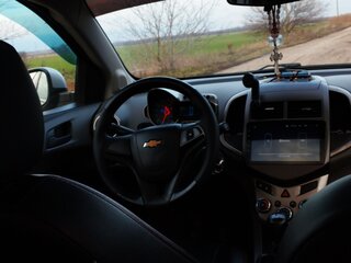 2012 Chevrolet Aveo II, серебристый, 550000 рублей, вид 2