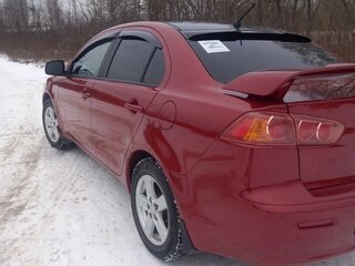 2008 Mitsubishi Lancer X, красный, 740000 рублей, вид 3