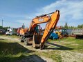 2022 Develon DX210W, белый, 11831000 рублей - вид 1