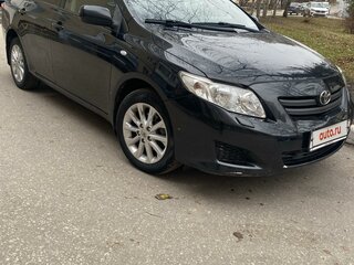 2008 Toyota Corolla X (E140, E150), чёрный, 1000000 рублей, вид 1