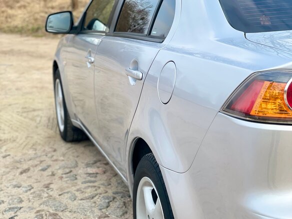 2011 Mitsubishi Lancer X Рестайлинг, серебристый, 805000 рублей - вид 8