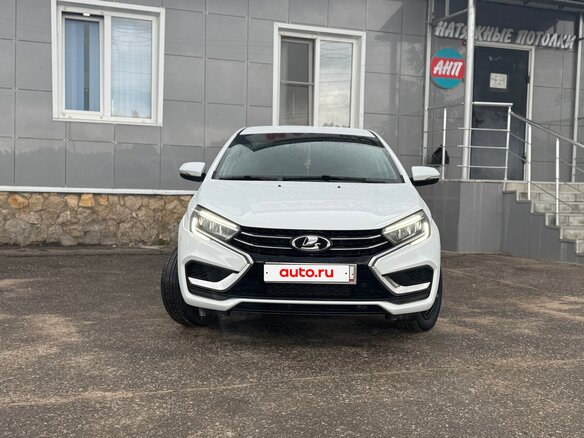 2024 Lada (ВАЗ) Vesta I Рестайлинг (NG), белый, 1390000 рублей - вид 2